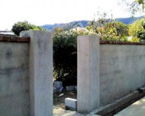 Contractor Building An Exterior Wall