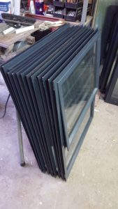 A photo of stacks of steel frame work.